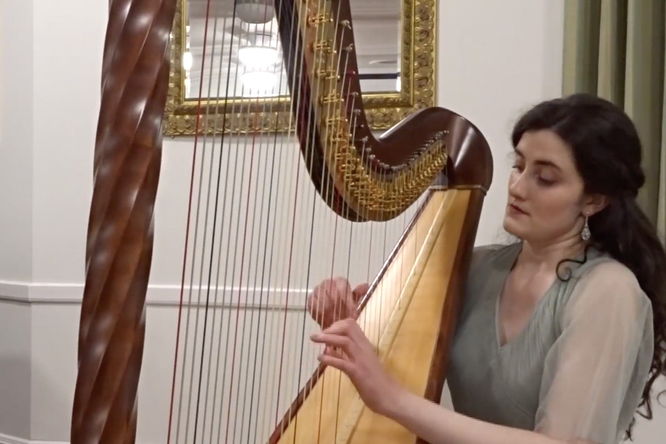 Tara Viscardi playing the harp, as part of 2021 North London Festival
